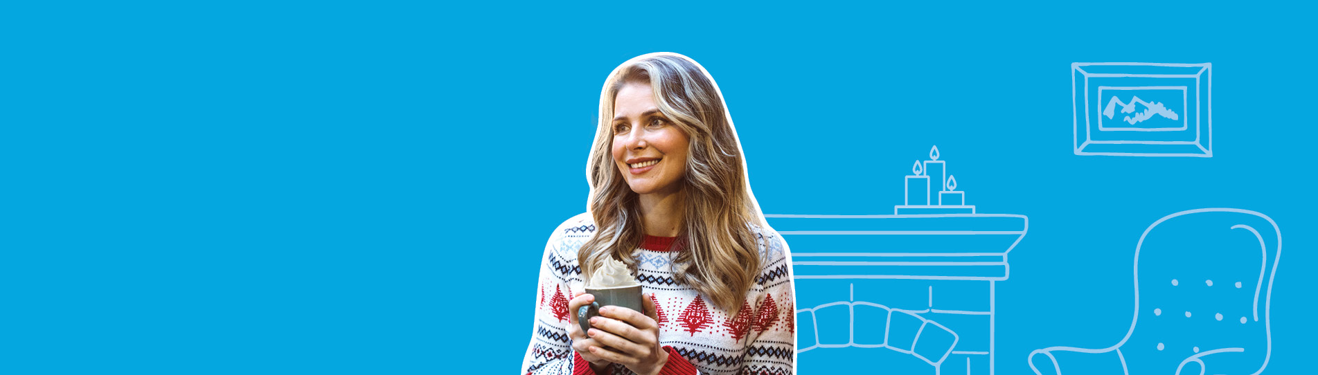 smiling woman wearing a holiday sweater with a peppermint mocha